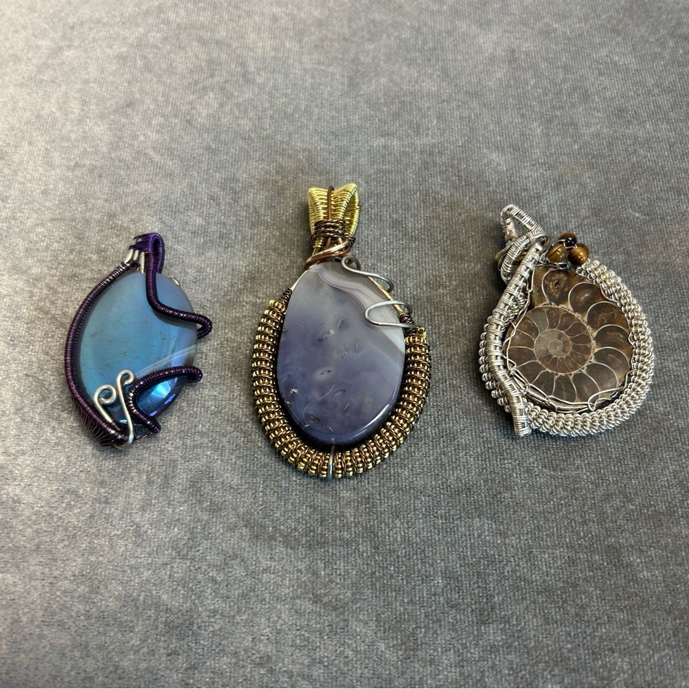 handmade wire-wrapped gemstone pendants blue agate purple agate ammonite fossil